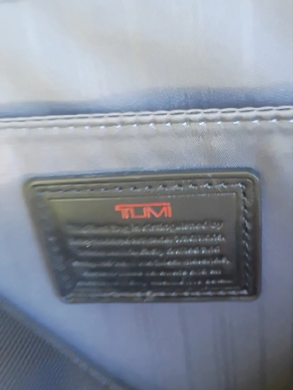 Tumi Black Nylon Messenger with Red Logo Accent